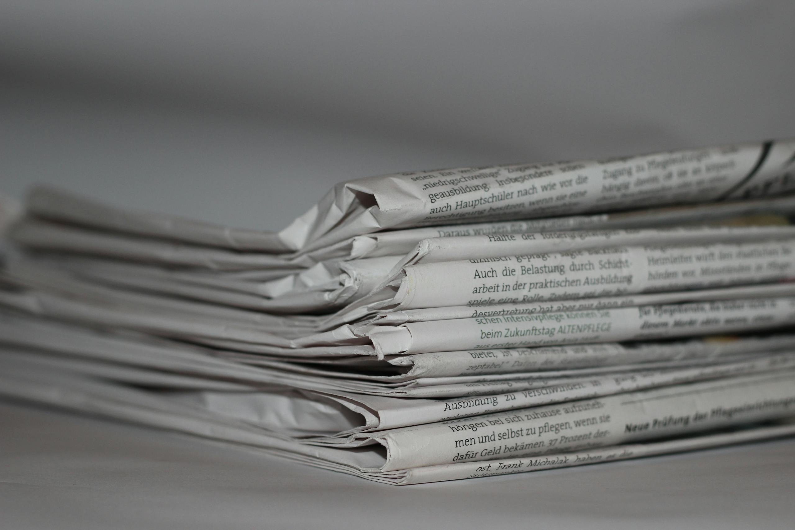 My News Pressure Release: My News Pressure Release Press Release A close-up image of folded newspapers, perfect for news or journalism themes.