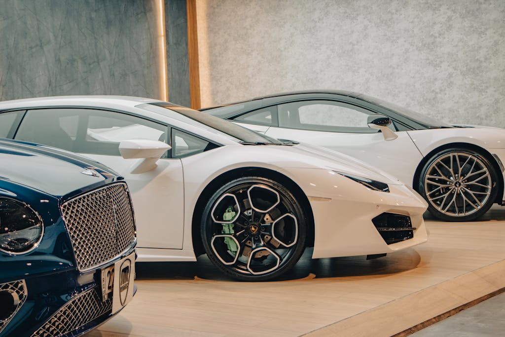 Wheon Grand Theft Auto: A Complete Deep Dive into the Iconic Open-World Phenomenon A lineup of sleek luxury sports cars on display in an upscale showroom setting.
