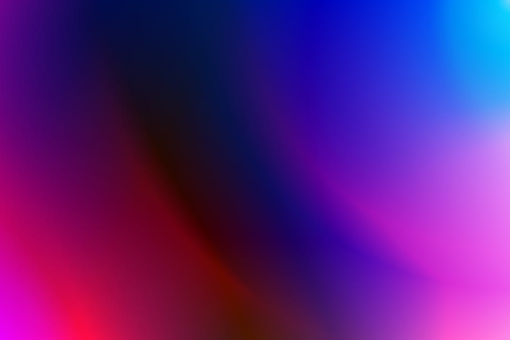 Simbramento A vivid abstract gradient featuring bold pink, purple, and blue hues.