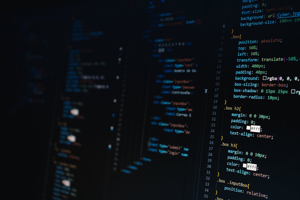 TabooTube Detailed view of HTML and CSS code on a dark screen, representing modern web development.