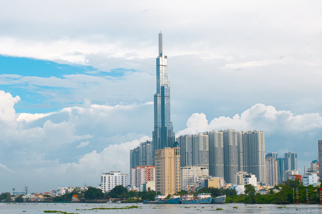 Check Whether 61479 Is Divisible by 81  Skyline of Ho Chi Minh City featuring Landmark 81 tower and surrounding high-rises.