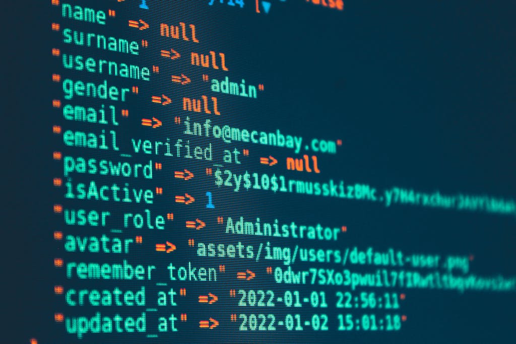HR Software Vibrant close-up of code displayed on a monitor with various programming details.