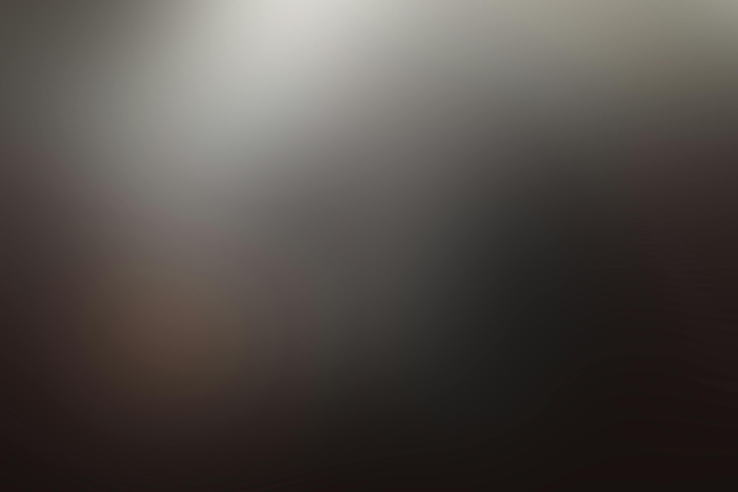 Chatpic A dark and moody abstract image with soft gradient blur, conveying mystery and depth.