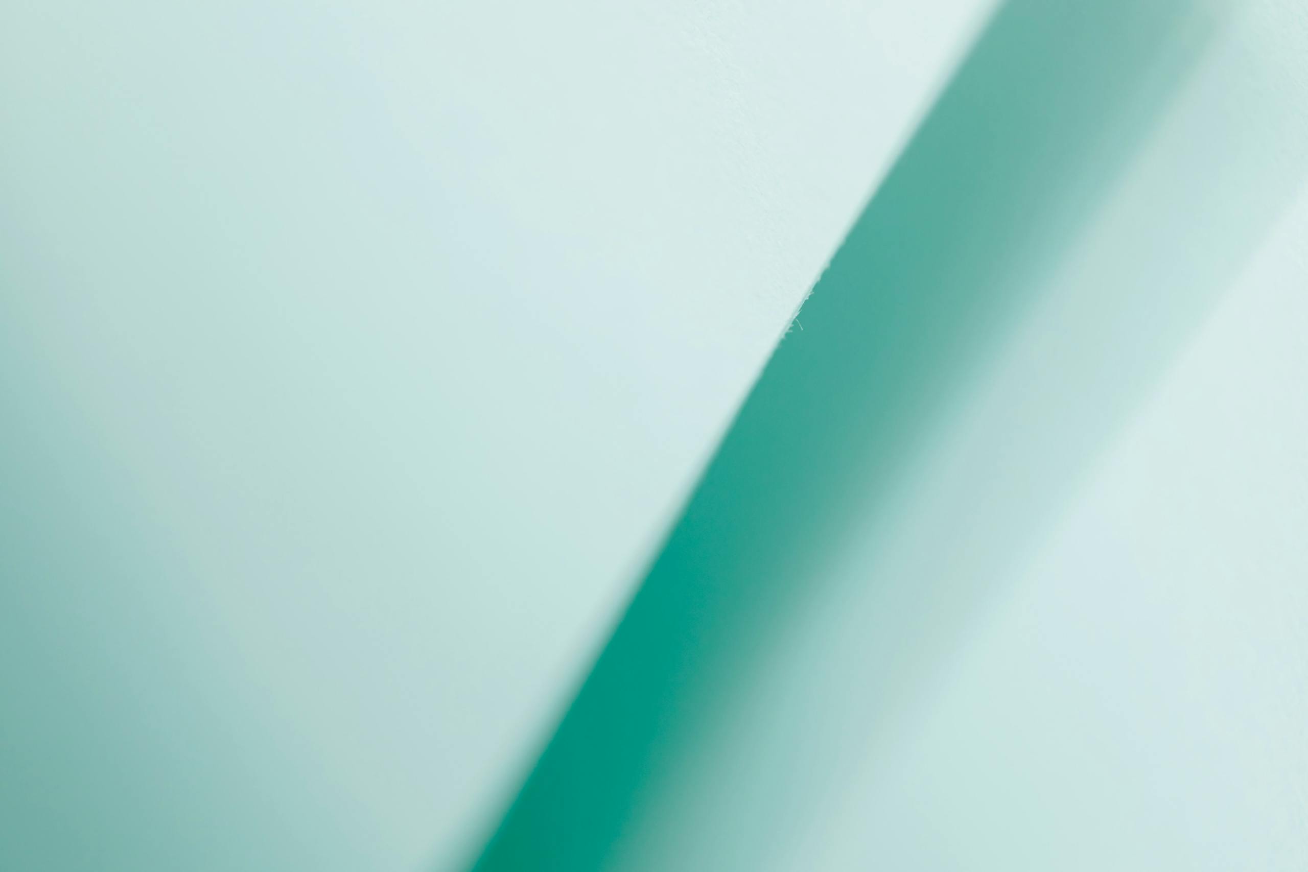 N123Safe67 Newtopy Abstract turquoise gradient background featuring a diagonal line, perfect for modern design projects.