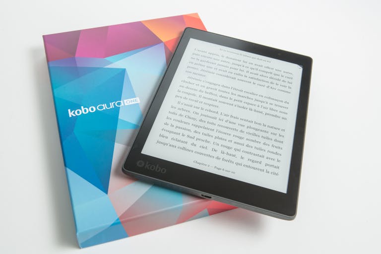 ReadSpeaker E-reader displayed on colorful packaging, showcasing ebook technology.