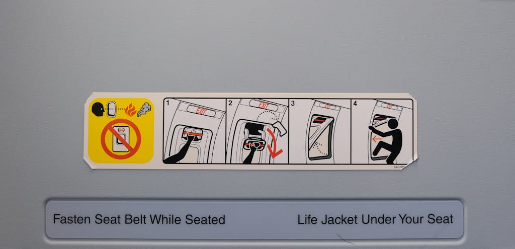 Crackstube Illustrated airplane exit instructions with safety features clearly detailed.