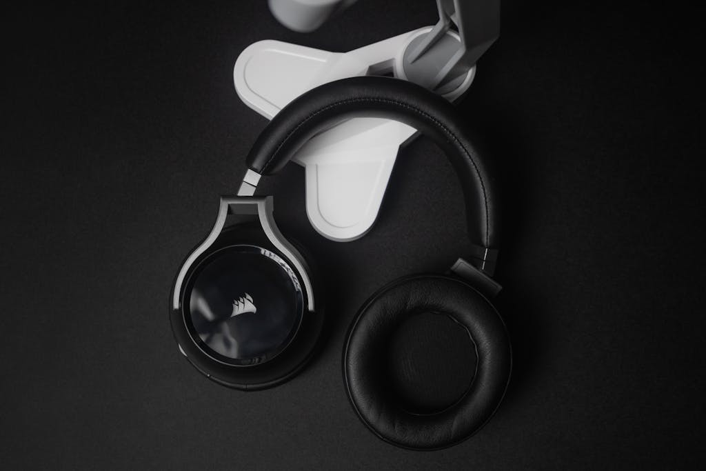 Trios 5 Invisalign Submission Modern black stereo headphones on a black background, perfect for tech and music themes.