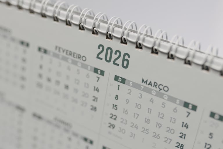 IPL League 2026 Close-up view of a 2026 spiral-bound desk calendar showing February and March.